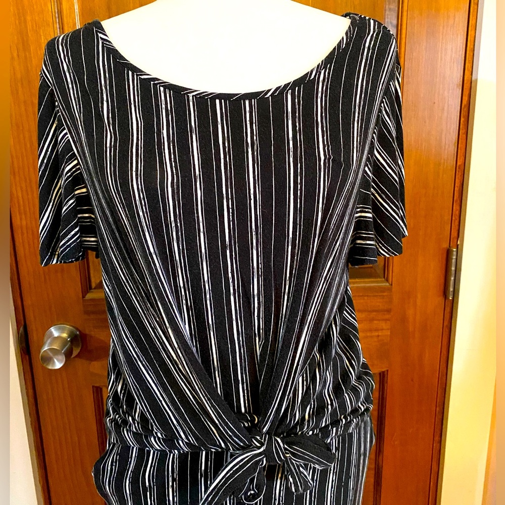 Pre-loved black and white striped outfit.